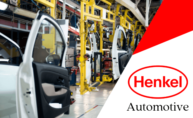 Automotive assembly line with Henkel Automotive logo