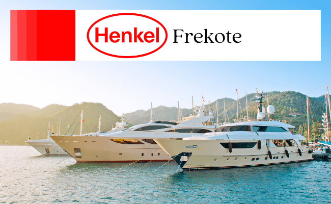 Multiple large boats docked with Henkel Frekote logo